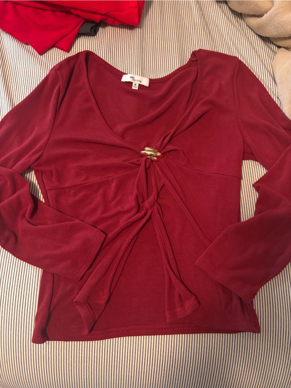 Knot-Front Long Sleeve Crop Top in Burgundy with Gold Accent